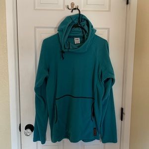 Authentic Melanzana bought in Leadville. I would say the size is M/L. Runs big.